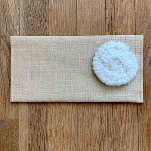 NWOT. Small envelope-style clutch. 10”x5”